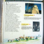 Panneau explicatif sur l'église et les statues-menhirs